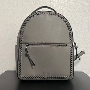 Calpak Kaya Faux Leather Round Backpack